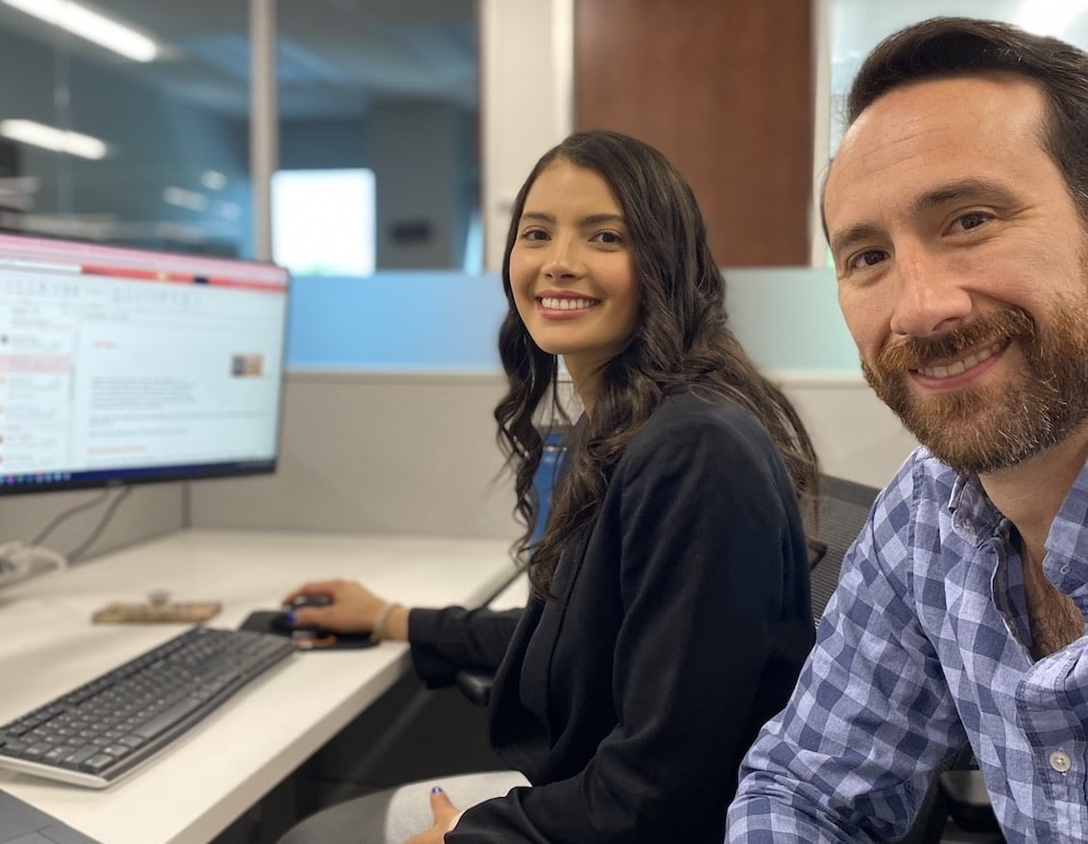 male and female engineers at desk